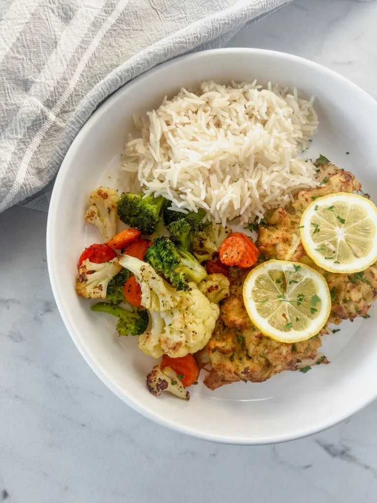 Easy Maryland Crab Stuffed Flounder Recipe-Plated with rice and veggies